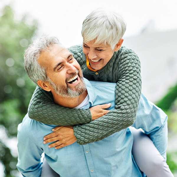 mature couple laughing together